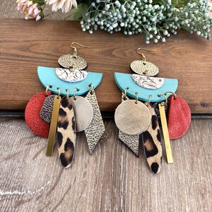 teal and gold earrings