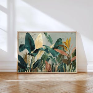 May include: A framed botanical print featuring a vibrant array of tropical foliage. The artwork showcases large, stylized leaves in shades of green, gold, and coral against a muted background. The wooden frame adds a natural touch to the artwork.