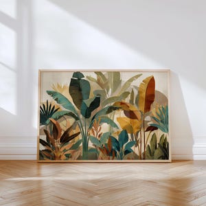 Peut inclure: Une impression d'art encadrée représentant une illustration vibrante de plantes tropicales. L'œuvre présente une variété de feuilles vertes luxuriantes, sarcelle et jaune doré, sur un fond neutre. Le cadre en bois ajoute une touche naturelle au thème botanique.