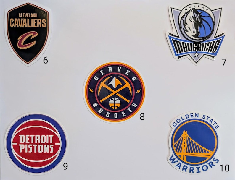 May include: Ten different NBA team logos on a white background. The logos are for the Cleveland Cavaliers, Dallas Mavericks, Denver Nuggets, Detroit Pistons, Golden State Warriors.