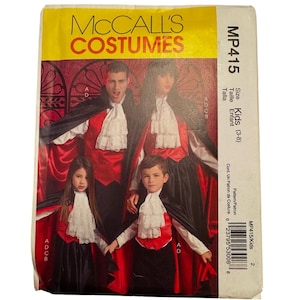 May include: McCall's Costumes pattern for Kids (3-8) featuring a family dressed in vampire costumes. The pattern includes capes, vests, and ruffled collars. The package has a yellow and red color scheme with the pattern number MP415.