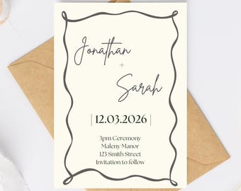 May include: A cream-colored wedding invitation with a dark gray wavy border and text. The text reads "Jonathan + Sarah" and "12.03.2026". Additional text includes ceremony details and address. The invitation is placed on a brown envelope.