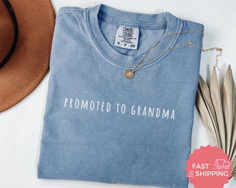 Comfort Colors® Werbung für Oma Shirt, lustiges Oma Geschenk, bestes Geschenk für neue Oma, Schwangerschaftsankündigung, Großmutter enthüllen T-Shirt