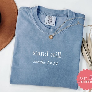 May include: A set of three ceramic mugs with a speckled, matte finish. The mugs are in shades of cream, light gray, and dark gray. Each mug has a simple, minimalist design, perfect for coffee or tea.