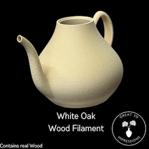 May include: A white oak wood filament 3D printed teapot with a textured surface. The teapot has a round body and a spout on the left side. The text "White Oak Wood Filament" and "Great 3D Impressions" is printed below the teapot.