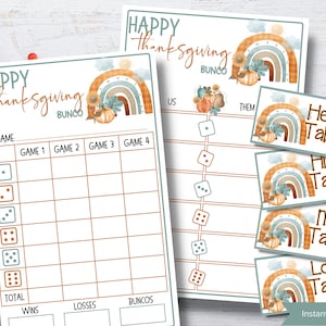 May include: Printable Thanksgiving Bunco scorecard with a rainbow and pumpkin design. The scorecard has spaces for four games, total wins, losses, and buncos.  The text "Happy Thanksgiving Bunco" is at the top of the scorecard.