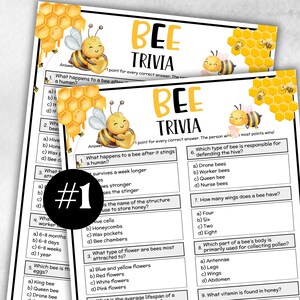 May include: Two sheets of "Bee Trivia" game cards. Each card features a cartoon bee, honeycomb graphics, and trivia questions. The text "BEE TRIVIA" is in yellow. A black circle with a white "#1" is on the bottom left.