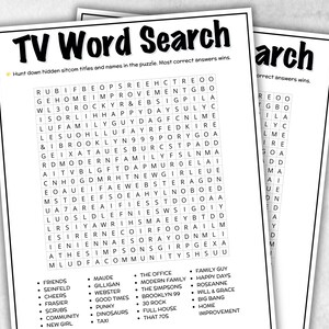 May include: Two white sheets of paper with a TV Word Search puzzle printed on each. The puzzles feature a grid of letters and a list of sitcom titles to find. The title "TV Word Search" is at the top.
