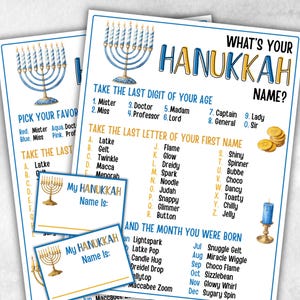 May include: A set of Hanukkah-themed game sheets and cards. The main sheet features a blue and gold menorah illustration and text that reads "What's Your Hanukkah Name?" with instructions. Smaller cards are also included.
