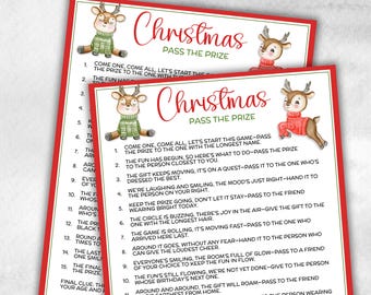 May include: Two Christmas party game sheets with a red border. The top of each sheet has the words "Christmas Pass the Prize" in red script. Cute reindeer illustrations in sweaters are on the sheets. The game instructions are printed below.
