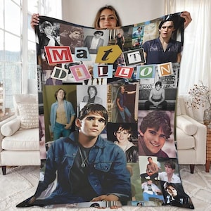 May include: A fleece blanket featuring a collage of images of Matt Dillon, with the name "Matt Dillon" spelled out in colorful block letters. The blanket showcases various photos of the actor in different poses and outfits.