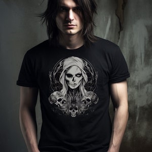 May include: A black t-shirt with a graphic print of a woman with a skull face and flowers. The woman is surrounded by three skulls.