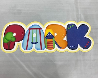 May include: Colorful, playful sign spelling "PARK" with each letter designed to resemble playground elements. The "P" features a tree, the "A" has swings, the "R" a slide, and the "K" has dots. The sign has a yellow border.