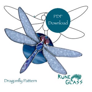 May include: A stained glass dragonfly pattern with blue, purple, and red glass. The pattern is available as a PDF download. The text "Dragonfly Pattern" and "Rune Glass" are visible in the image.