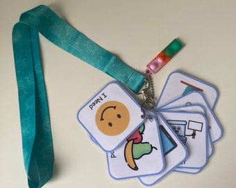 Basic needs communication cards on lanyard with sensory fidget