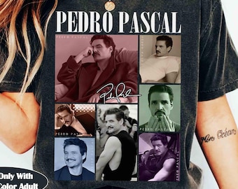 May include: Dark gray t-shirt featuring a collage of images of Pedro Pascal, with his signature and the name "Pedro Pascal" in white. The shirt also has the text "Pepper Only With Comfort Color Adult".
