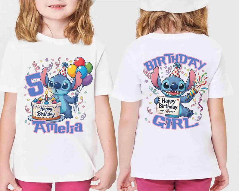 May include: White t-shirt featuring a cartoon character holding balloons and a birthday cake. The front of the shirt has the number 5 and the name "Amelia". The back of the shirt says "Birthday Girl".