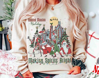 Chemise de Noël lumineuse de Jack Skellington et faisant de l'auto-stop, t-shirt lumineux de Noël de manoir hanté de Disney, cadeau de vacances de Disneyland
