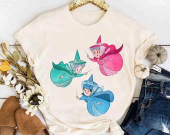 Camisetas de Good Fairies Flora Fauna Merryweather Make It Blue Pink Green, camiseta de personajes de La Bella Durmiente de Disney, viaje familiar a Magic Kingdom 2026