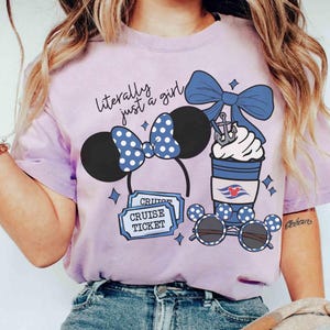 May include: A light purple t-shirt with the text "literally just a girl." The shirt features a Minnie Mouse ear headband with a blue polka dot bow, a cruise ticket, a coffee cup, and sunglasses.