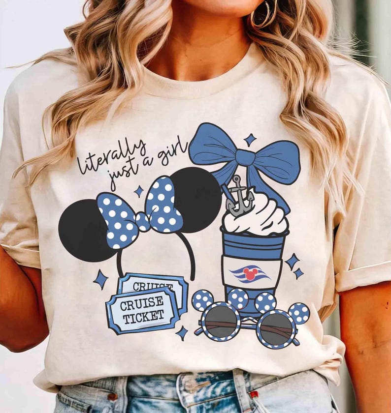May include: Beige t-shirt with a graphic featuring a Minnie Mouse ear headband, sunglasses, and a coffee cup, all with blue polka dots. The text "literally just a girl" is above the ears. Includes cruise tickets.