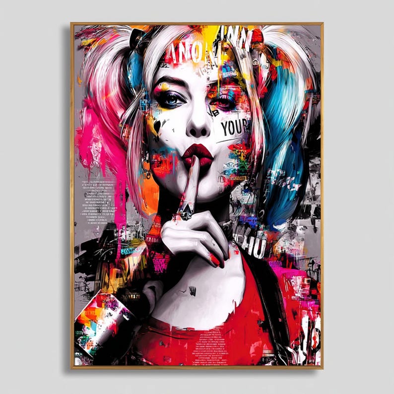 May include: Pop art style portrait of a woman with white and blue pigtails, red lips, and a finger to her lips. The artwork features vibrant colors, including pink, yellow, and blue, with text overlays. The image is framed in a gold-colored frame.