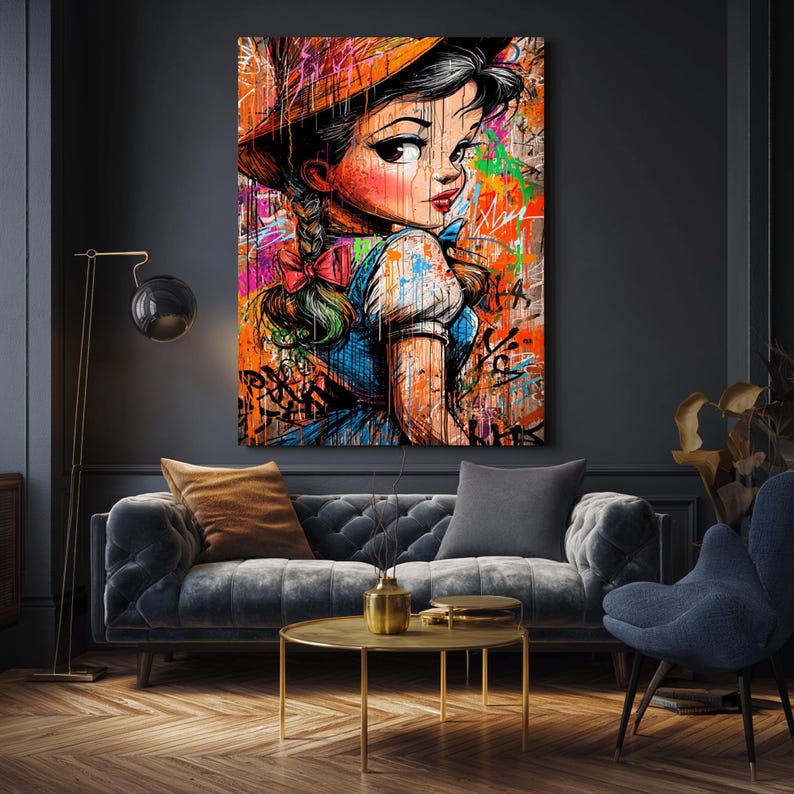 May include: A large wall art print featuring a stylized portrait of a woman with a hat, braids, and a blue dress. The artwork is overlaid with colorful graffiti and paint splatters, creating a vibrant and modern aesthetic.