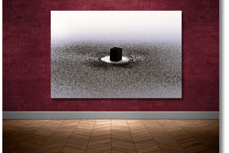 May include: A black and white abstract art print depicting a black cube surrounded by a swirling pattern of lines. The lines appear to be radiating outward from the cube, creating a sense of movement and energy.