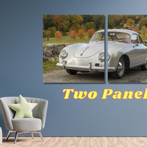 May include: A silver Porsche 356A coupe with a black interior, parked in front of a stone wall and a fall foliage background. The car is split into two panels, with the left panel showing the front of the car and the right panel showing the side of the car.