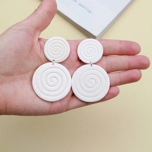 White plastic button best sale earrings