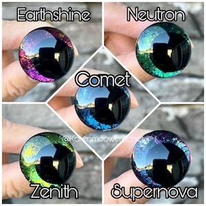May include: Four round glass eyes with black pupils and glitter accents. The eyes are labelled "Earthshine", "Neutron", "Comet", and "Supernova".