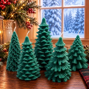 May include: Five dark green wax candles shaped like stylised Christmas trees with tiered, textured branches and white wicks. The candles are arranged on a wooden surface, with a lantern and pine branches visible in the background.