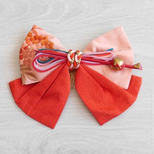 Kanzashi Japanese hair ornament red and pink fabric with red and gold lacquered pin