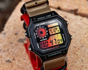 Sunrise 22 – Modified Watch Based on Casio AE-1200 – Fire Red Gradient Screen – Beige Military Strap 22mm – Hydro Mod – Custom Casio Royale