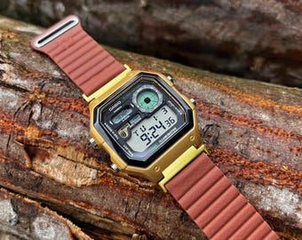 CASIO AE-1200 カスタマイズ Casio AE-1200 をベースに改造した時計。カラフルな偏光 LCD