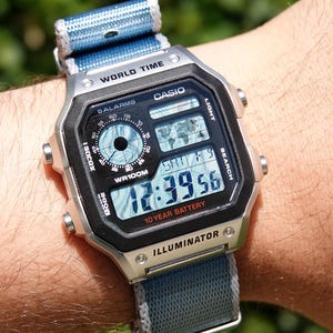 Blue Marble – Modified Watch Based on Casio AE-1200 – Casio Mod Custom Royale Blue Marble Display, Hydro Mod, Retro Modified Digital Watch