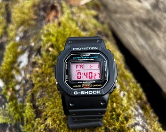 ストロベリークリア – 改造G-Shock DW-5600 – レッド偏光ディスプレイ