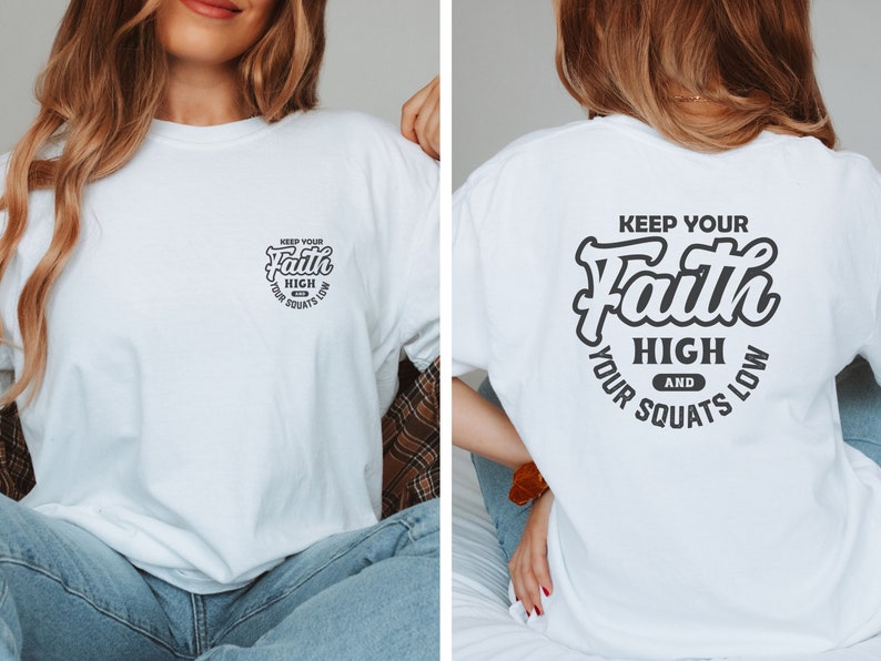 May include: White t-shirt with a black graphic print on the front and back. The graphic says "Keep Your Faith High And Your Squats Low".