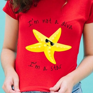May include: Red t-shirt with a yellow cartoon starfish wearing sunglasses and the text "I'm not a diva I'm a star"