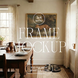May include: A dining room scene with a wooden table set for a meal. A framed painting of a fox hangs on the wall. The text "FRAME MOCKUP" is displayed. A cat rests on a rug near the table. The text "PSD FILE WITH SMART OBJECTS" is also displayed.