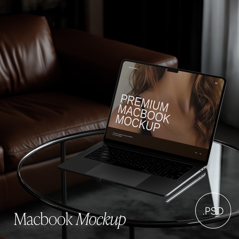 May include: A black Macbook laptop on a glass table with the text "PREMIUM MACBOOK MOCKUP" on the screen. The laptop is open, displaying a woman's image. The words "Macbook Mockup" are at the bottom of the image.