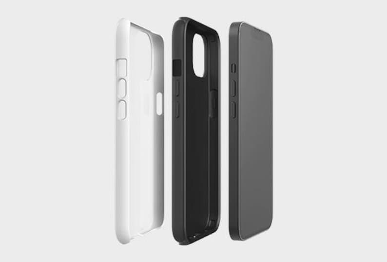 May include: Three phone cases: a white case, a black case, and a phone. The white case is on the left, the black case is in the middle, and the phone is on the right. The cases and phone are all in a vertical orientation.