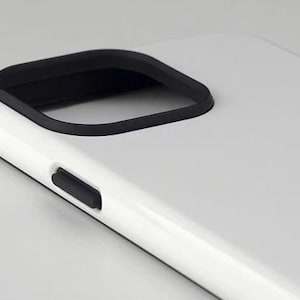 May include: A white phone case with a black camera cutout and a black side button. The case has a smooth, glossy finish and a minimalist design. The phone case is designed to protect the phone.