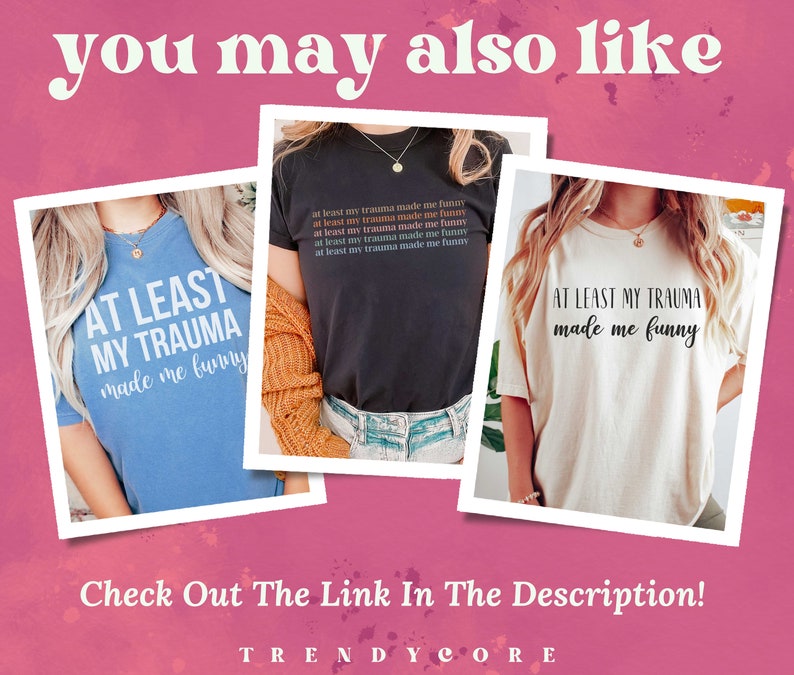 May include: Three t-shirts with the text "At least my trauma made me funny" in different colours. The shirts are blue, black, and white.