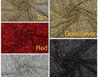 May include: A close-up of five fabric swatches with sequins. The swatches are in the colors tan, gold/silver, red, silver, and black.