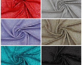 May include: A close-up of six fabric swatches in different colors. The fabric is a shiny, iridescent material with a chainmail-like texture. The colors are red, silver, lavender, beige, turquoise, and black.