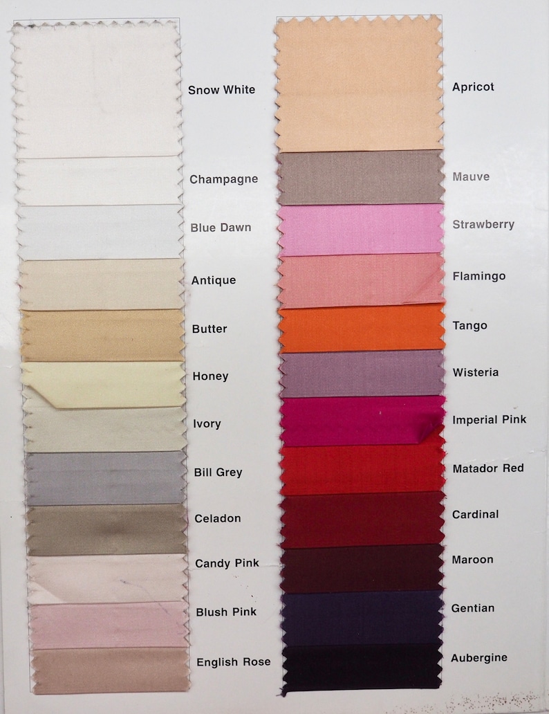 May include: A color chart of fabric swatches with names for each color, including Snow White, Apricot, Champagne, Blue Dawn, Antique, Mauve, Strawberry, Flamingo, Butter, Tango, Honey, Ivory, Wisteria, Imperial Pink, Matador Red, Bill Grey, Celadon, Cardinal, Candy Pink, Maroon, Blush Pink, Gentian, English Rose, and Aubergine.