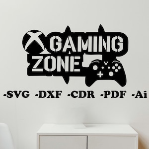 May include: Black and white graphic design of a video game controller with the text "Gaming Zone" and an Xbox logo. The design is on a white wall with a white chair and a white cabinet in the background.