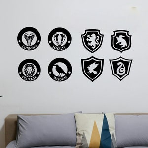 May include: Black and white wall decals featuring animal and bird imagery with the words "Cunning", "Loyalty", "Courage", "Wisdom", "Gryffindor", "Hufflepuff", "Ravenclaw", and "Slytherin".