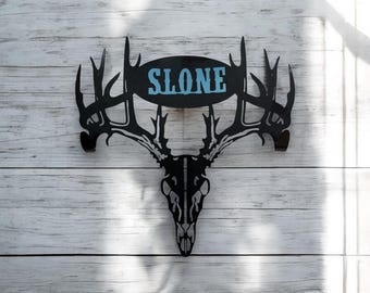 Deer skull bow/gun hanger